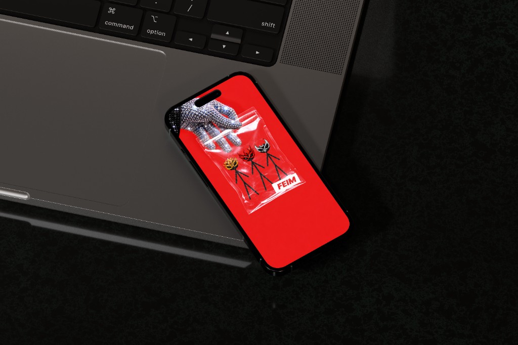 feim — phone mockup on laptop
